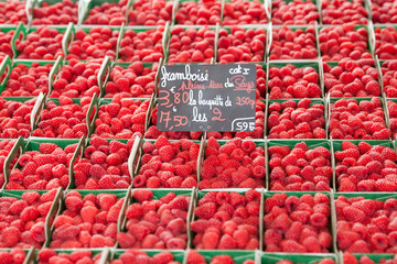 Ripe raspberries on the market