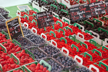 Fresh berries on the counter market