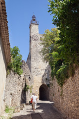 Fototapeta na wymiar The view of old street at Vaison-la-Romaine in summer sunny day