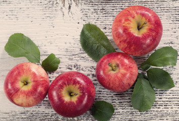 Apples on wooden background