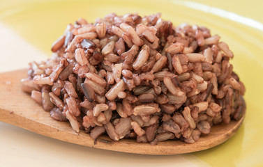 cooked rice on wood Ladle