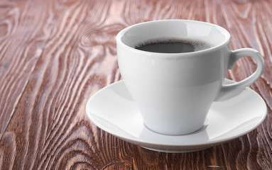 coffee cup with space on the wooden table