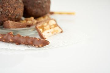 Cupcake with chocolate on wooden background