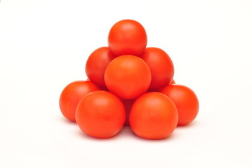 Pyramid of fresh red tomato on white background