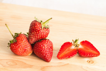Fresh strawberry on wood.