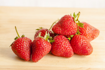 Fresh strawberry on wood.