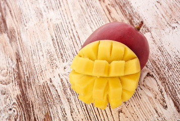 Mango fruit on wood