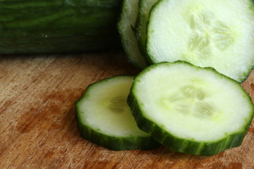 Sliced Cucumber on Wooden Cutting Board