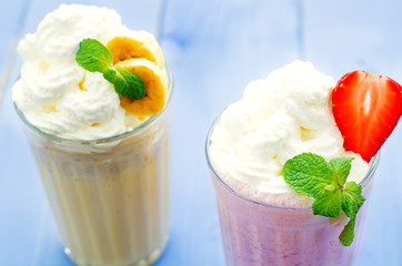 strawberry and banana milkshake with whipped cream