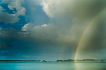 雨上がり虹がかかる沖縄 羽地内海