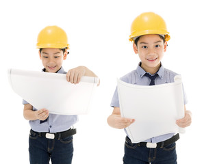 Young asian child construction engineer Holding equipment