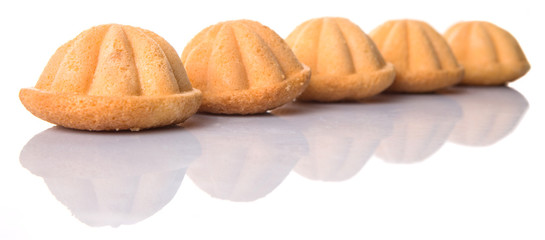 Kuih bahulu, Malay sweet egg sponge muffin cake on white