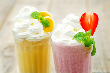 strawberry and banana milkshake with whipped cream