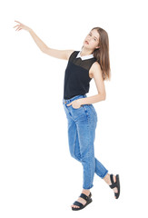Young fashion girl in jeans posing isolated