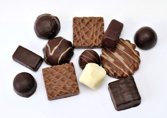 set of sweets of white and dark chocolate