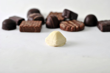 set of sweets of white and dark chocolate