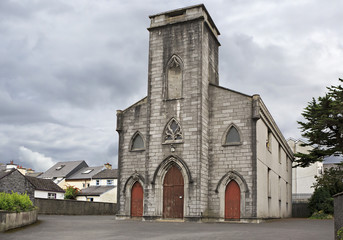 Fototapeta na wymiar Old church in the yard of Saint Patrick's Church
