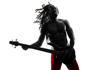 african man guitarist bassist  player playing silhouette