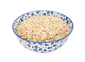 Porridge oats in a blue and white china bowl