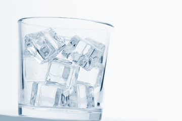 glass with ice cubes