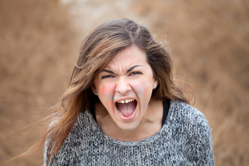 Angry girl with painted face