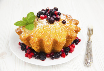 banana muffin with fresh berries and mint