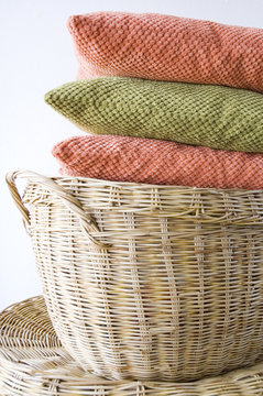 colorful pillow on basket