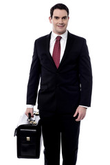 Male entrepreneur carrying a briefcase