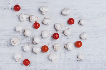 White button mushrooms and cherry tomatoes