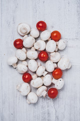 White button mushrooms and cherry tomatoes