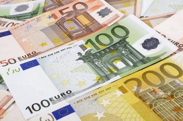 Background from a lot of euro banknotes.