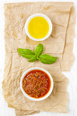 Italian cooking ingredients, pasta, beef stew sauce, fresh tomat