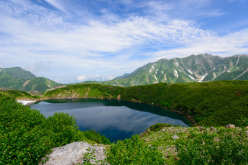 Naklejka na ściany i meble Mikurigaike pond in the Tateyama mountain range in Toyama, Japan