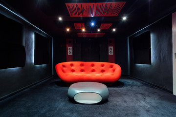 Red sofa in the basement