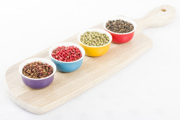 Peppercorns - Szechuan, pink, green and black dried peppercorns