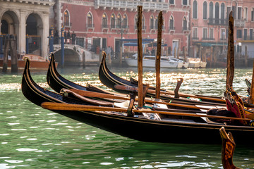 Fototapeta na wymiar Gondolas floating on Grand Canal in Venice. Italy
