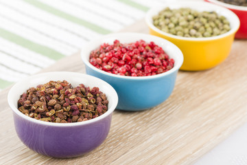 Peppercorns - Szechuan, pink, green and black dried peppercorns