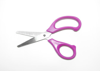 pink scissor on white background