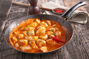 chicken curry sauce in pan