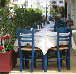 Blue chairs on a greek cafe on Zakinthos