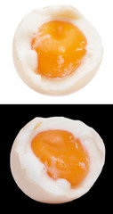 egg with yolk on black and white background
