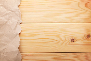 Cardboard paper over wooden background