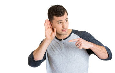 man with hand behind ear listening closely carefully 