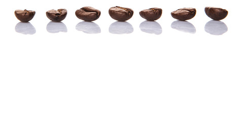 Roasted coffee bean over white background