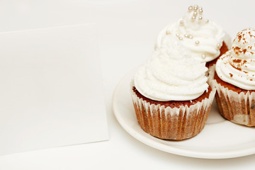 Cupcakes with whip cream and blank card - add own text