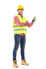 Man in reflective vest and hardhat showing thumb up