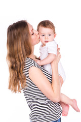 Beautiful baby and mother playing
