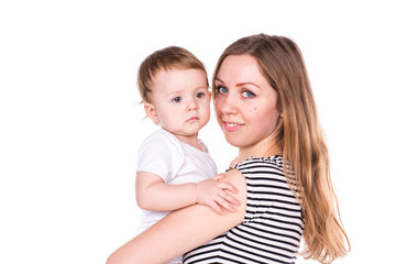 Beautiful baby and mother playing