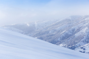beautiful Tien-Shan mountains in the snow. in winter