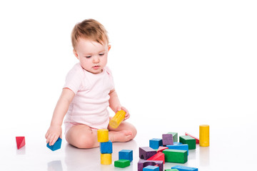 Beautiful baby building with cubes
